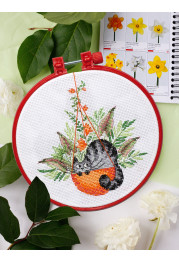 Cross-stitch kits And in the basket is a cat