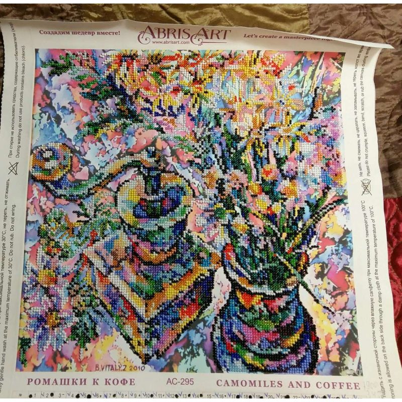 Charts on artistic canvas Сamomiles and coffee