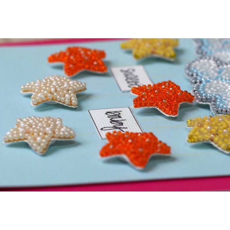 Keychain cross-stitch kit Among stars and clouds