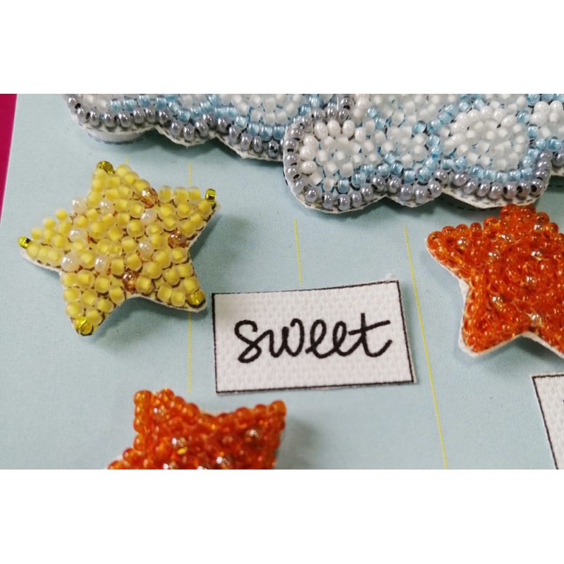Keychain cross-stitch kit Among stars and clouds