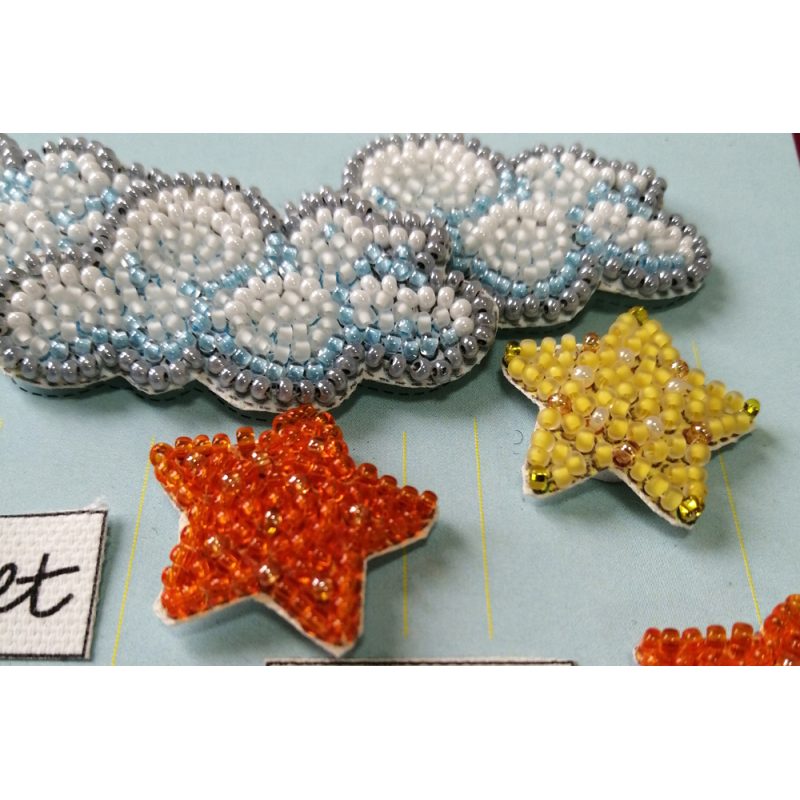 Keychain cross-stitch kit Among stars and clouds